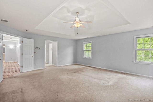 657 Tamarack Rd, Cheshire, CT 06410 - unfurnished room featuring a tray ceiling, carpet, a ceiling fan, and baseboards