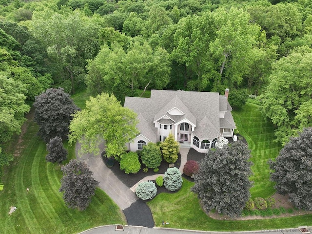 657 Tamarack Rd, Cheshire, CT 06410 - aerial view of property and surrounding area featuring a heavily wooded area