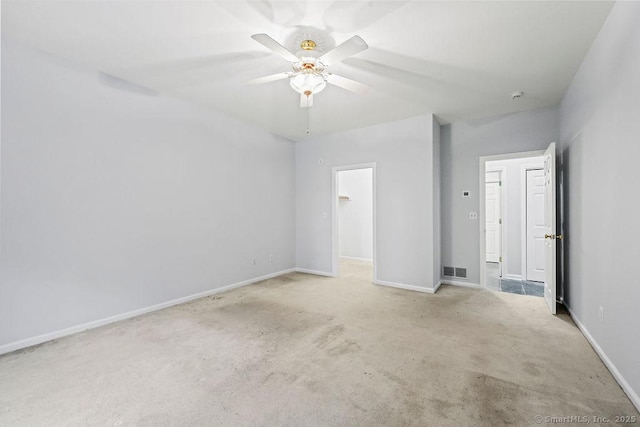 657 Tamarack Rd, Cheshire, CT 06410 - unfurnished bedroom featuring light colored carpet, baseboards, and a walk in closet