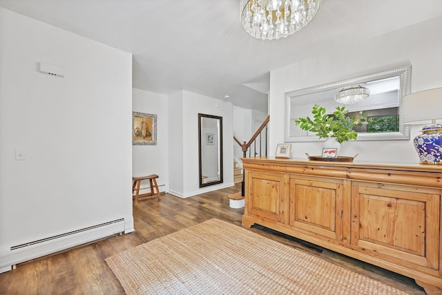 30 Norfield Woods Rd, Weston, CT 06883 - hall with dark wood finished floors, a chandelier, stairway, and a baseboard radiator