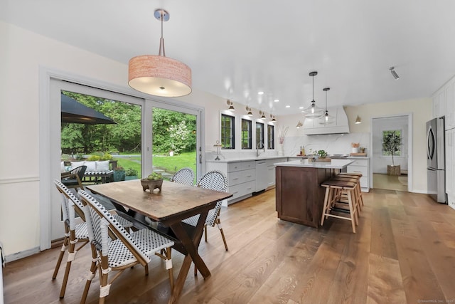 30 Norfield Woods Rd, Weston, CT 06883 - dining room with light wood-type flooring and recessed lighting