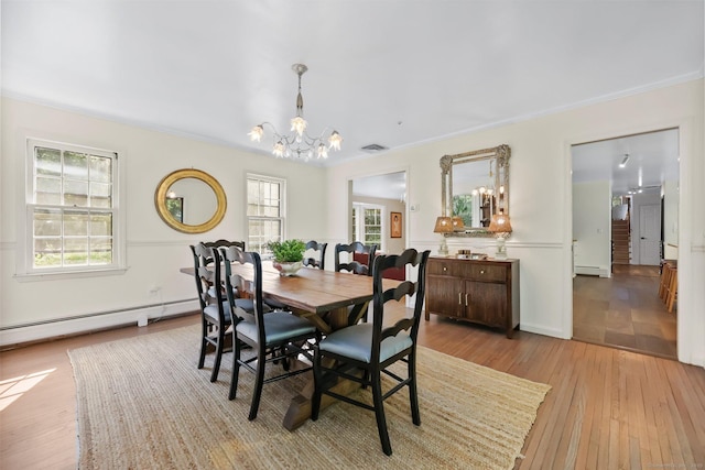 30 Norfield Woods Rd, Weston, CT 06883 - dining space with a chandelier, a baseboard heating unit, wood finished floors, a baseboard radiator, and crown molding
