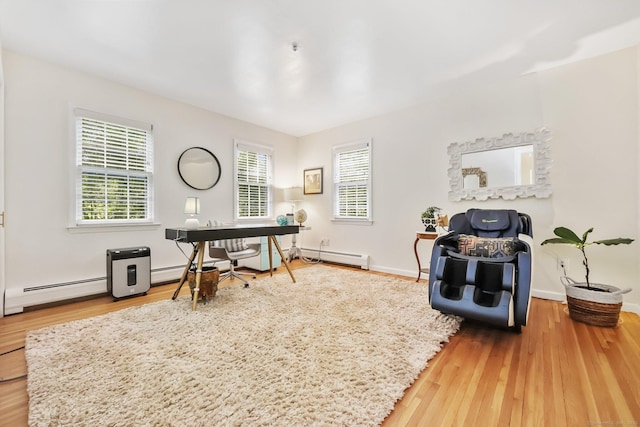 30 Norfield Woods Rd, Weston, CT 06883 - office area with wood finished floors, baseboard heating, baseboards, and a baseboard radiator