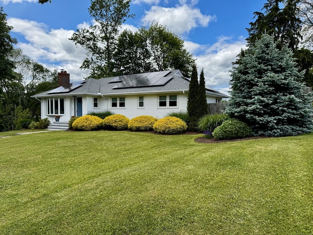 38 Kingston Rd, Trumbull, CT 06611 - ranch-style home with a chimney, solar panels, a shingled roof, and entry steps