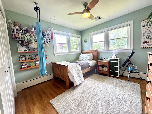 38 Kingston Rd, Trumbull, CT 06611 - bedroom with a baseboard radiator, wood finished floors, and a ceiling fan