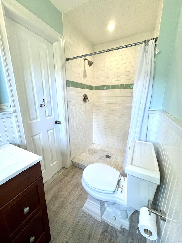 38 Kingston Rd, Trumbull, CT 06611 - bathroom with tiled shower, wood finished floors, and vanity