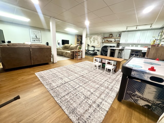 38 Kingston Rd, Trumbull, CT 06611 - kitchen with light wood-style flooring, a drop ceiling, and open shelves