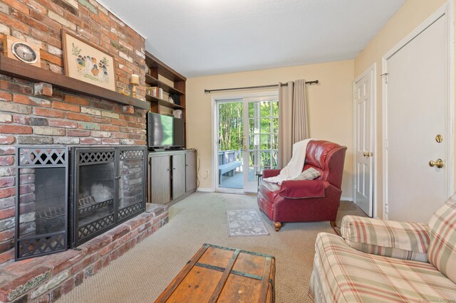 12 Whispering Rod Rd, Farmington, CT 06085 - carpeted living area with a brick fireplace and baseboards