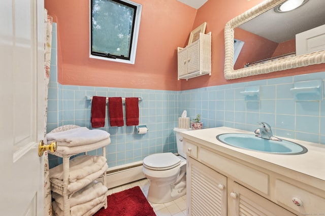 12 Whispering Rod Rd, Farmington, CT 06085 - bathroom with a baseboard heating unit, toilet, tile patterned floors, vanity, and tile walls