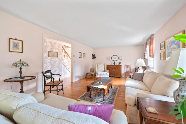 12 Whispering Rod Rd, Farmington, CT 06085 - living room with light wood-style floors and stairway