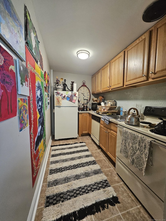 40 Owen St Apt D6, Hartford, CT 06105 - kitchen featuring white appliances, light tile patterned floors, and a sink