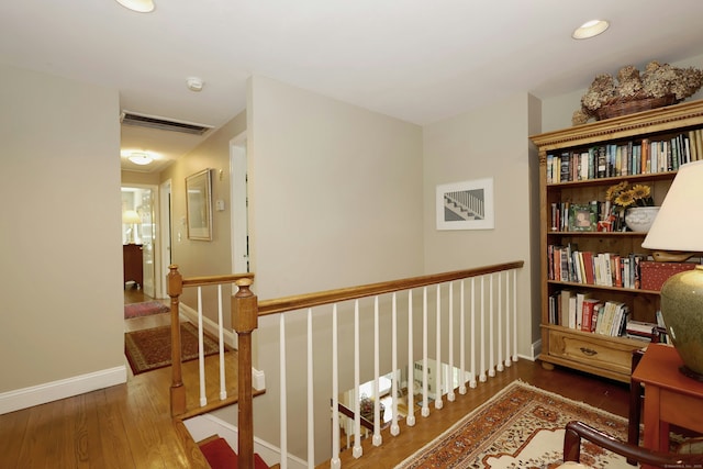 114 Peaceable Ridge Rd, Ridgefield, CT 06877 - hallway with wood finished floors, baseboards, an upstairs landing, and recessed lighting