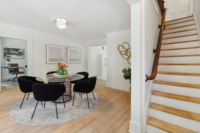 8 Washington Ave, Westport, CT 06880 - dining area featuring stairway, wood finished floors, and baseboards