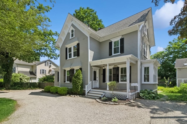 8 Washington Ave, Westport, CT 06880 - view of front of home with covered porch and gravel driveway