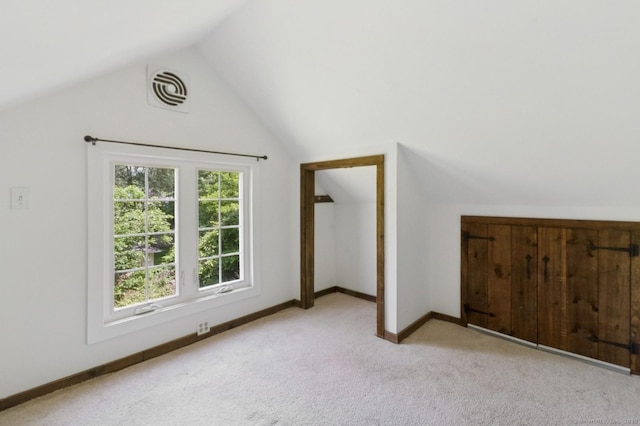 8 Washington Ave, Westport, CT 06880 - additional living space with vaulted ceiling, carpet flooring, and baseboards