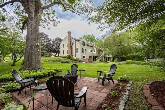 61 Baldwin Brook Rd, Canterbury, CT 06331 - view of patio / terrace featuring a fire pit