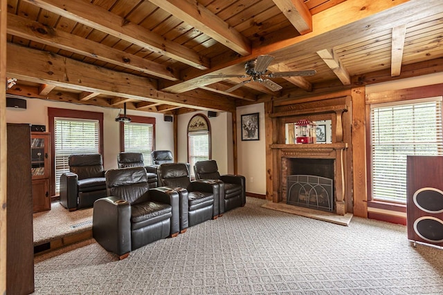 61 Baldwin Brook Rd, Canterbury, CT 06331 - home theater room with carpet, wooden ceiling with exposed beams, a fireplace with raised hearth, and ceiling fan