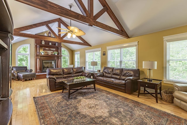 61 Baldwin Brook Rd, Canterbury, CT 06331 - living area featuring light wood-style floors, ceiling fan, and a glass covered fireplace