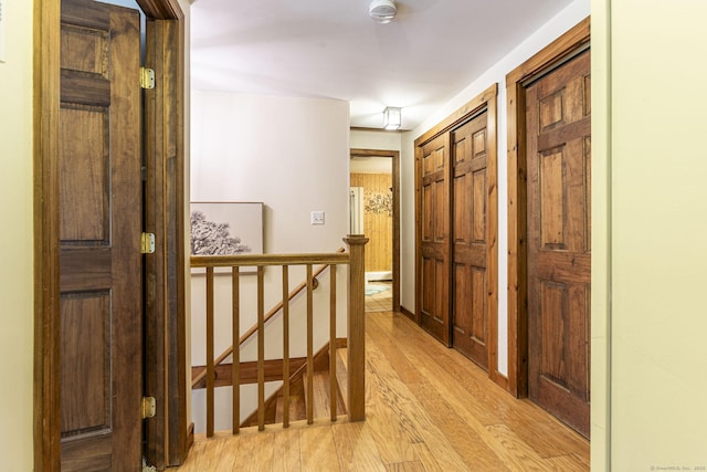 61 Baldwin Brook Rd, Canterbury, CT 06331 - corridor featuring an upstairs landing and light wood-style floors