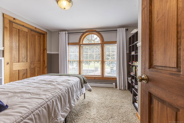 61 Baldwin Brook Rd, Canterbury, CT 06331 - carpeted bedroom featuring baseboard heating