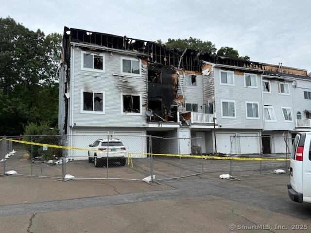 9 Staffordshire Commons Dr Unit 9, Wallingford, CT 06492 - view of building exterior featuring an attached garage