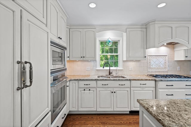 3 Colonial Dr, Clinton, CT 06413 - kitchen with stainless steel appliances, a sink, white cabinetry, decorative backsplash, and recessed lighting