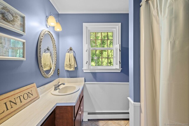 3 Colonial Dr, Clinton, CT 06413 - bathroom featuring a baseboard heating unit, tile patterned floors, vanity, and crown molding