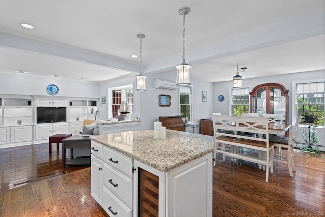 3 Colonial Dr, Clinton, CT 06413 - kitchen featuring wine cooler, a wall unit AC, dark wood-type flooring, white cabinetry, and recessed lighting