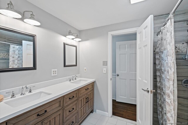 3 Colonial Dr, Clinton, CT 06413 - full bath with tile patterned floors, double vanity, and a shower with curtain