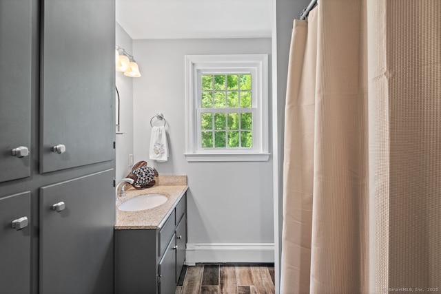 3 Colonial Dr, Clinton, CT 06413 - bathroom featuring vanity, wood finished floors, and a shower with shower curtain