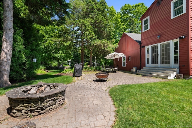 3 Colonial Dr, Clinton, CT 06413 - view of patio featuring an outdoor fire pit, entry steps, and a grill