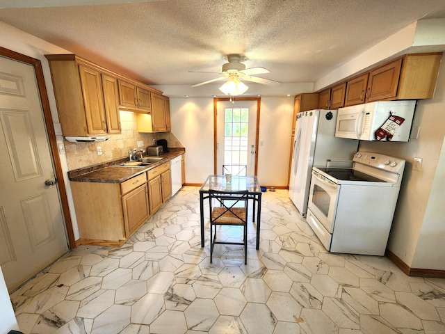 148 Millbrook Rd, Meriden, CT 06450 - kitchen with white appliances, ceiling fan, backsplash, dark countertops, and baseboards
