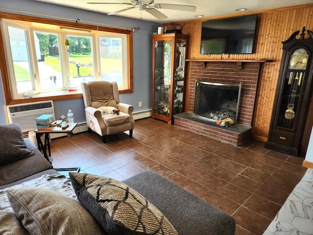 148 Millbrook Rd, Meriden, CT 06450 - living area featuring a baseboard heating unit, ceiling fan, a brick fireplace, baseboards, and dark tile patterned flooring