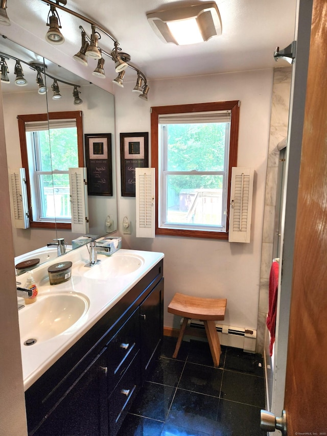 148 Millbrook Rd, Meriden, CT 06450 - bathroom with double vanity, tile patterned flooring, and a baseboard radiator