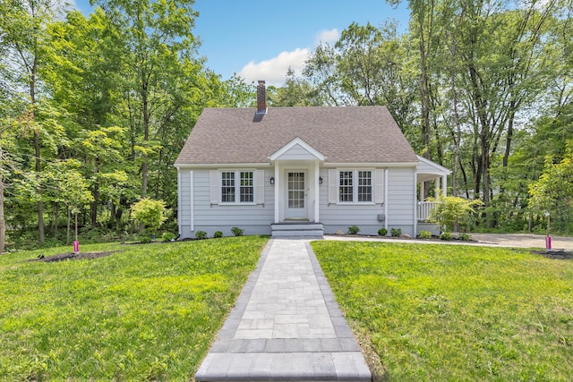 189 Tashua Rd, Trumbull, CT 06611 - view of front of property featuring a front yard, a chimney, and a shingled roof