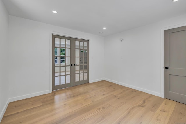 189 Tashua Rd, Trumbull, CT 06611 - unfurnished room featuring french doors, light wood-type flooring, and recessed lighting