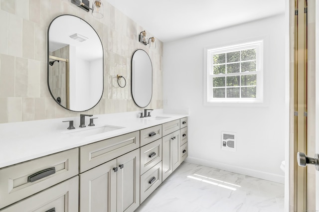 189 Tashua Rd, Trumbull, CT 06611 - full bath with double vanity, heating unit, marble finish flooring, and a shower