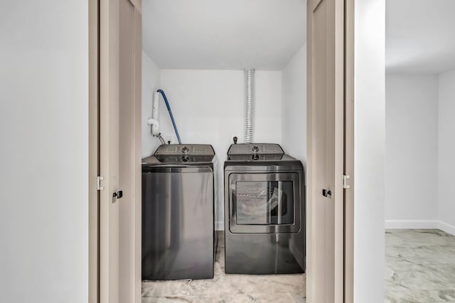 189 Tashua Rd, Trumbull, CT 06611 - laundry area featuring washing machine and clothes dryer and marble finish floors