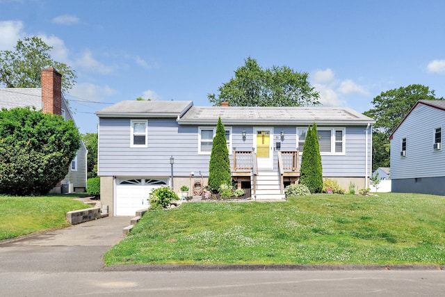 55 Osborne St, Stratford, CT 06614 - ranch-style home featuring an attached garage, driveway, and a front yard