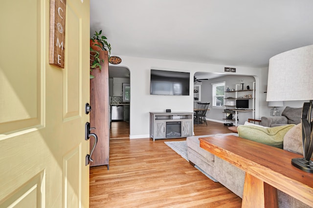 55 Osborne St, Stratford, CT 06614 - living room with light wood-type flooring and ceiling fan
