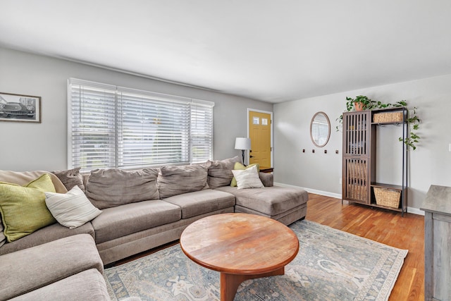 55 Osborne St, Stratford, CT 06614 - living area with light wood-style flooring and baseboards