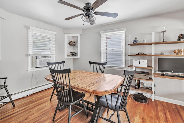 55 Osborne St, Stratford, CT 06614 - dining area featuring healthy amount of natural light, a ceiling fan, cooling unit, and light wood-type flooring