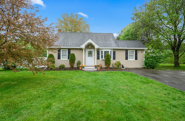 21 Sorrento Rd, Wallingford, CT 06492 - cape cod house featuring a chimney, a front lawn, and a shingled roof