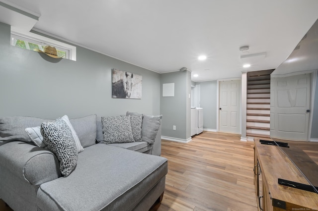 21 Sorrento Rd, Wallingford, CT 06492 - living area featuring washer / clothes dryer, light wood finished floors, baseboards, recessed lighting, and ornamental molding