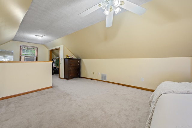21 Sorrento Rd, Wallingford, CT 06492 - unfurnished bedroom featuring vaulted ceiling, carpet, baseboards, ceiling fan, and a textured ceiling