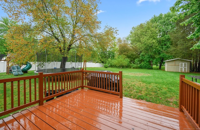 21 Sorrento Rd, Wallingford, CT 06492 - wooden deck featuring a trampoline and a playground