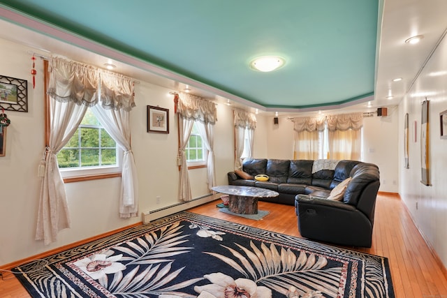 41 Alpine Rd, Monroe, CT 06468 - living area featuring a baseboard heating unit, plenty of natural light, and light wood-style floors