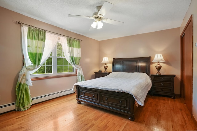 41 Alpine Rd, Monroe, CT 06468 - bedroom with light wood-style flooring, a textured ceiling, and ceiling fan