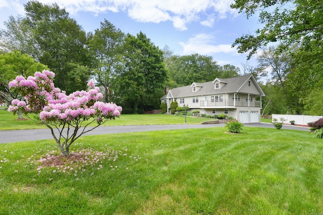 41 Alpine Rd, Monroe, CT 06468 - view of yard featuring an attached garage and driveway