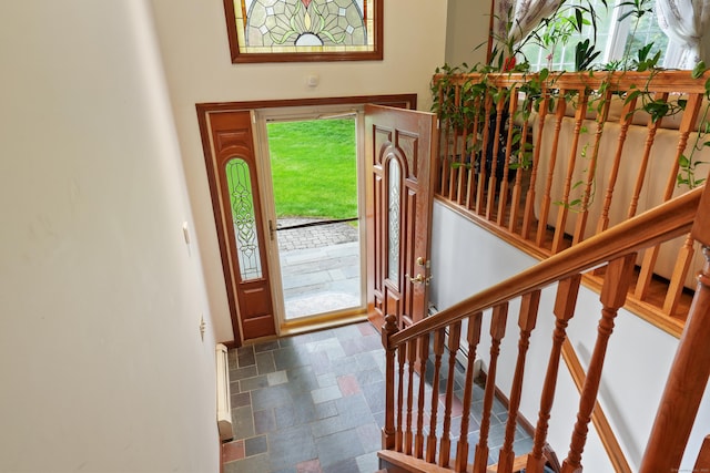 41 Alpine Rd, Monroe, CT 06468 - entryway with stone finish flooring, stairway, and baseboards